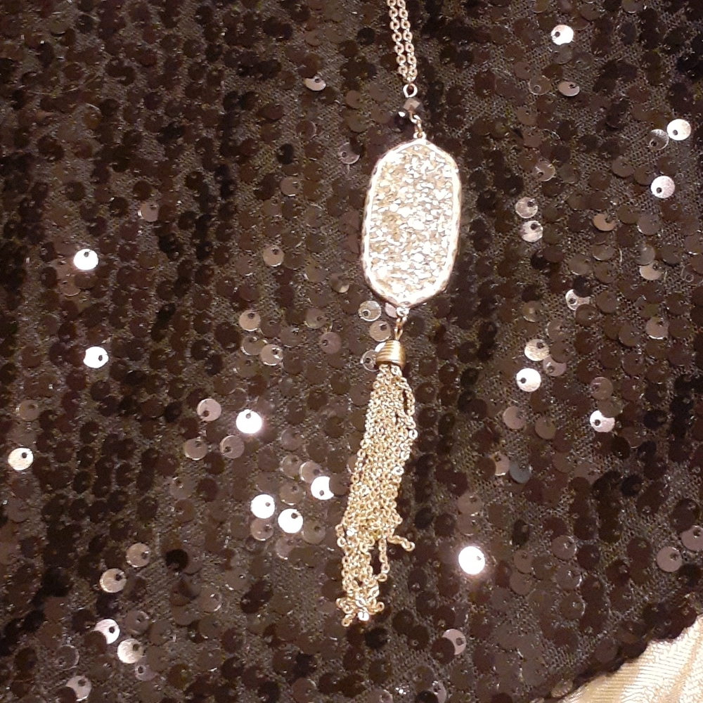 Long Silver tone tassle Necklace.